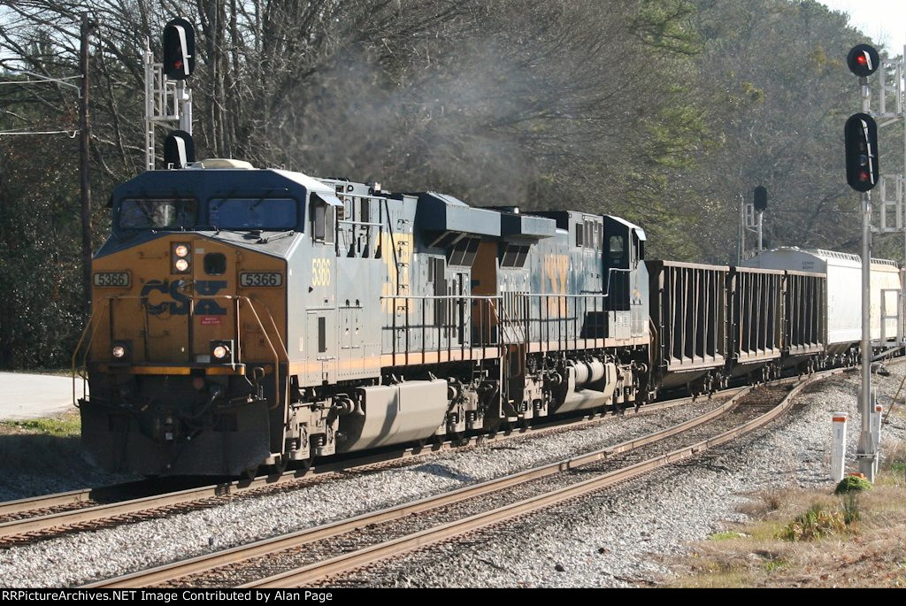 CSX 5366 and 3 pound past the signals